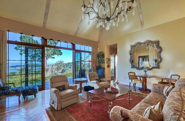 living room featuring parquet flooring, high vaulted ceiling, and a chandelier