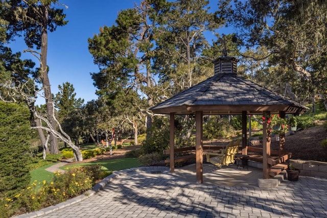 view of community with a gazebo and a patio area