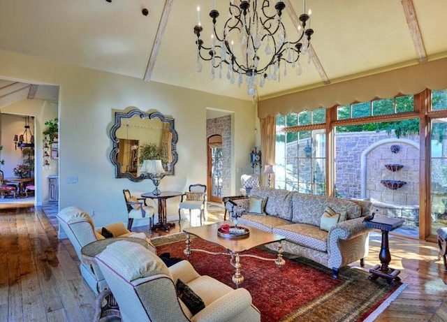 living room with a notable chandelier, vaulted ceiling with beams, and wood-type flooring