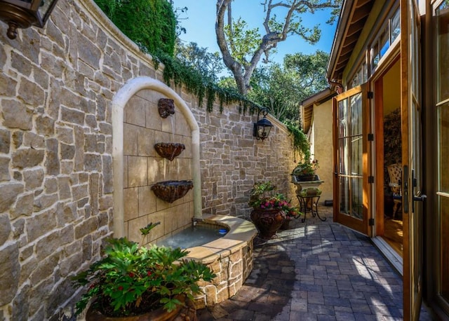 view of patio featuring french doors