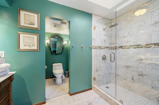 bathroom with vanity, an enclosed shower, and toilet