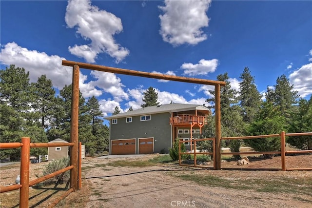 view of side of property featuring a garage