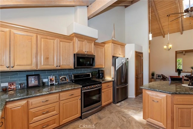 kitchen with tasteful backsplash, high vaulted ceiling, stainless steel appliances, and decorative light fixtures