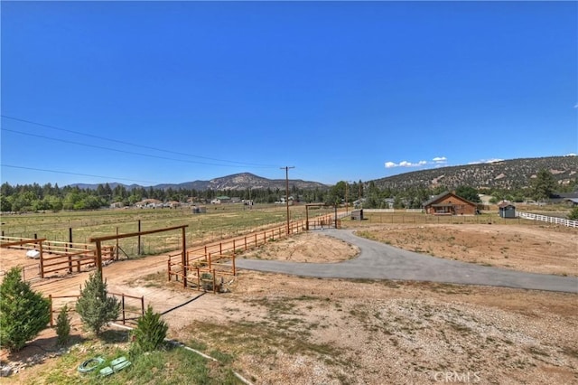 exterior space featuring a mountain view and a rural view