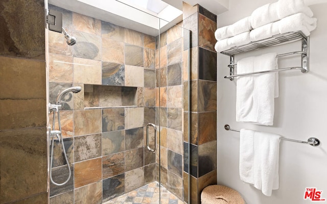 bathroom featuring an enclosed shower