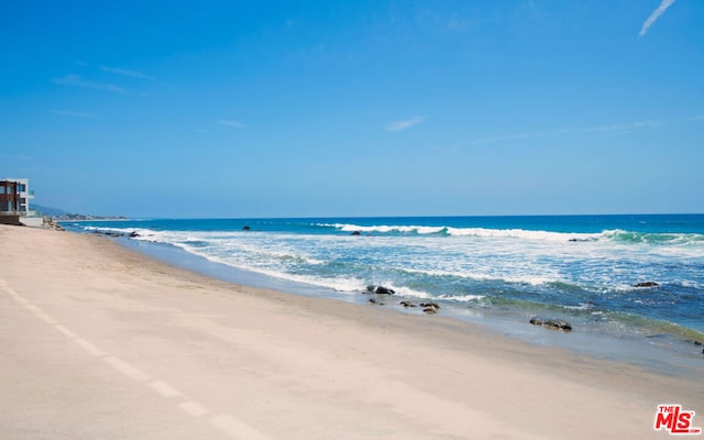 property view of water with a beach view