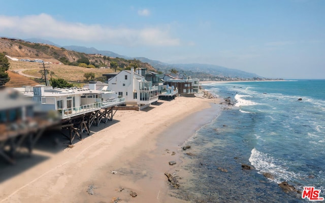 aerial view featuring a beach view and a water view