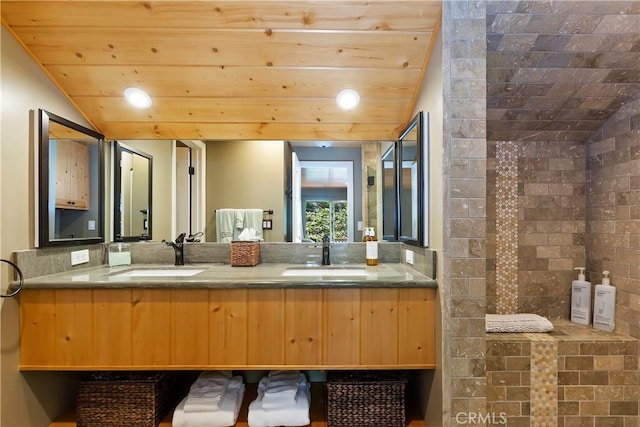 bathroom with vanity, vaulted ceiling, and wooden ceiling