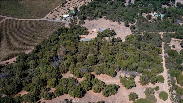 birds eye view of property featuring a rural view