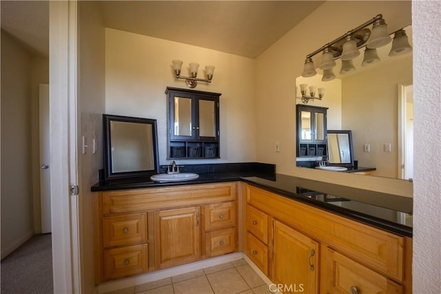 bathroom featuring tile patterned floors and vanity