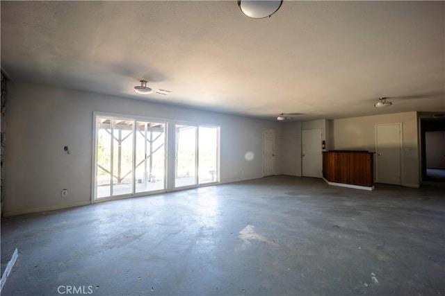 interior space featuring concrete flooring