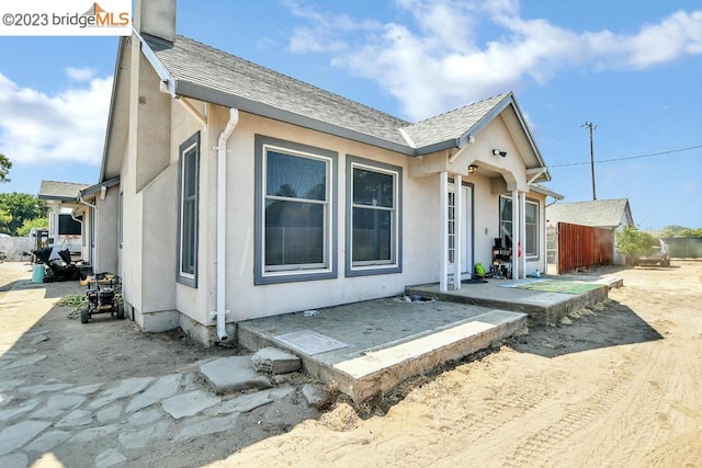 rear view of house featuring a patio area