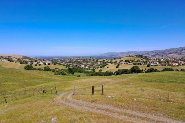 mountain view featuring a rural view