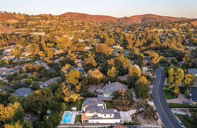 aerial view at dusk with a mountain view