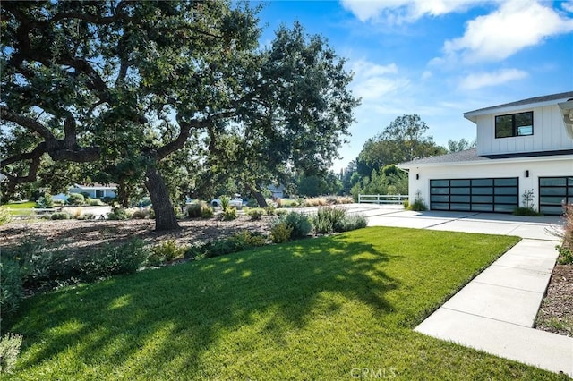 view of yard with a garage