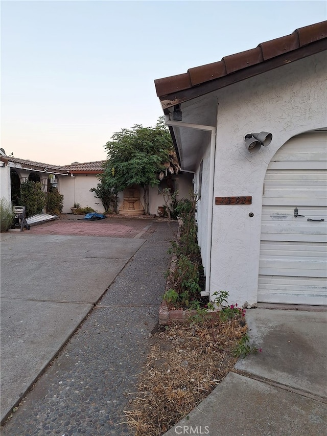 view of property exterior at dusk