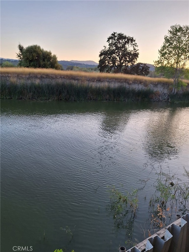 property view of water featuring a mountain view