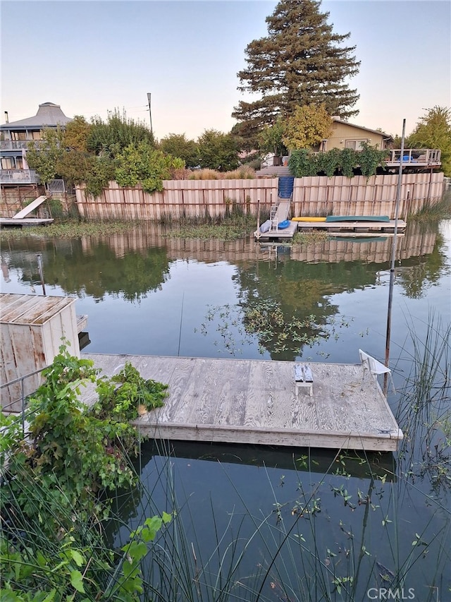 view of dock with a water view