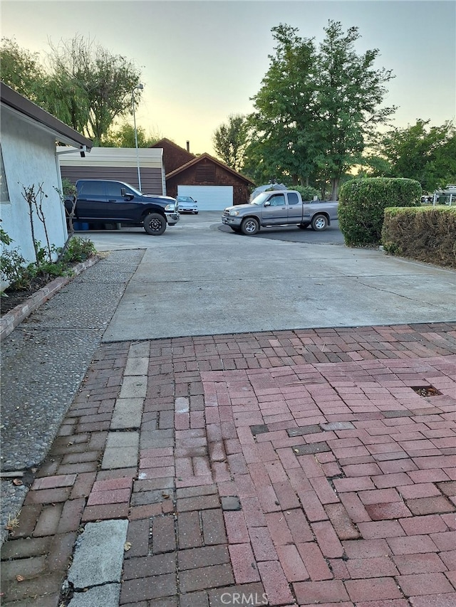 view of parking at dusk