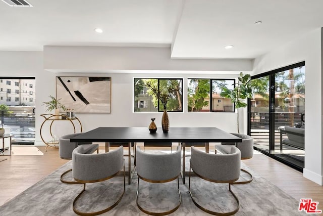 dining space featuring light hardwood / wood-style flooring