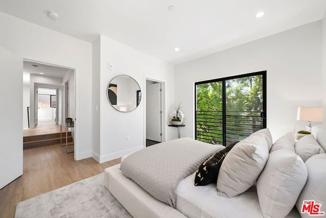 bedroom featuring light wood-type flooring