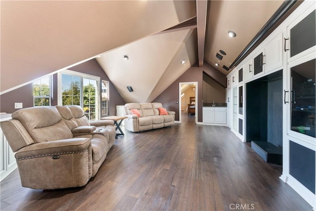 living room featuring vaulted ceiling with beams and dark hardwood / wood-style floors