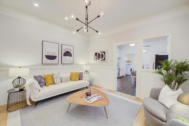 living room with an inviting chandelier