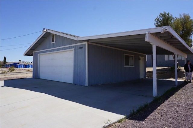 view of home's exterior with a carport