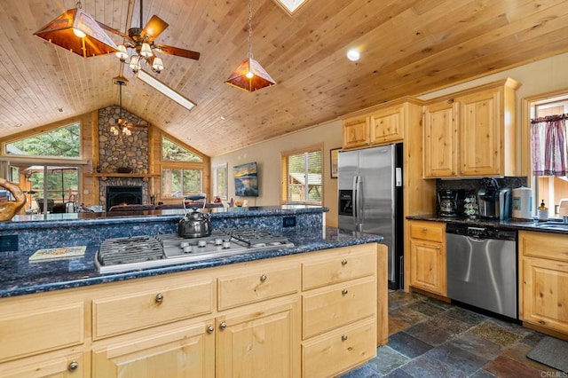 kitchen featuring ceiling fan, decorative light fixtures, appliances with stainless steel finishes, and wooden ceiling