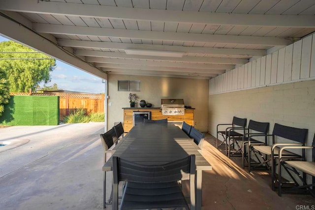 view of patio / terrace featuring an outdoor kitchen and grilling area