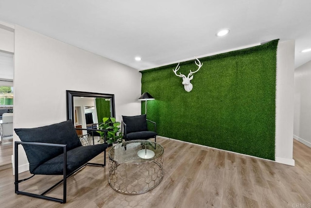 sitting room with light hardwood / wood-style floors