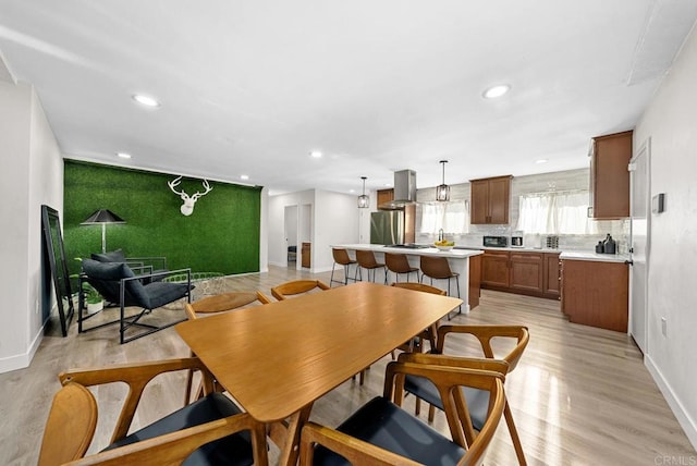 dining area featuring light hardwood / wood-style flooring