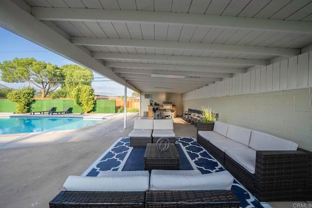 view of patio featuring a fenced in pool and outdoor lounge area