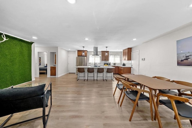 dining area featuring light hardwood / wood-style floors