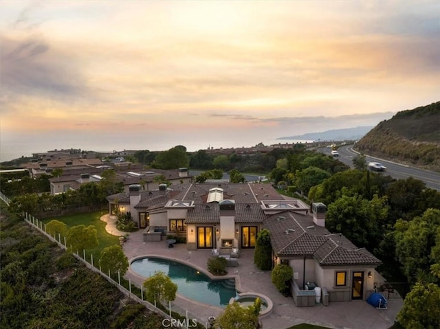 view of aerial view at dusk