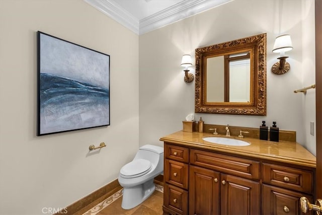 bathroom with tile patterned flooring, vanity, toilet, and crown molding