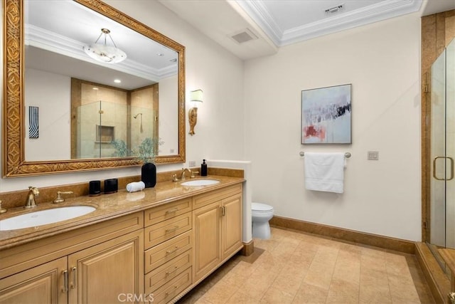 bathroom with a raised ceiling, crown molding, toilet, a shower with door, and vanity