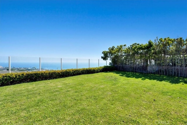 view of yard with a water view