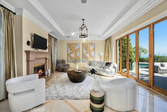 living room with ornamental molding and a notable chandelier