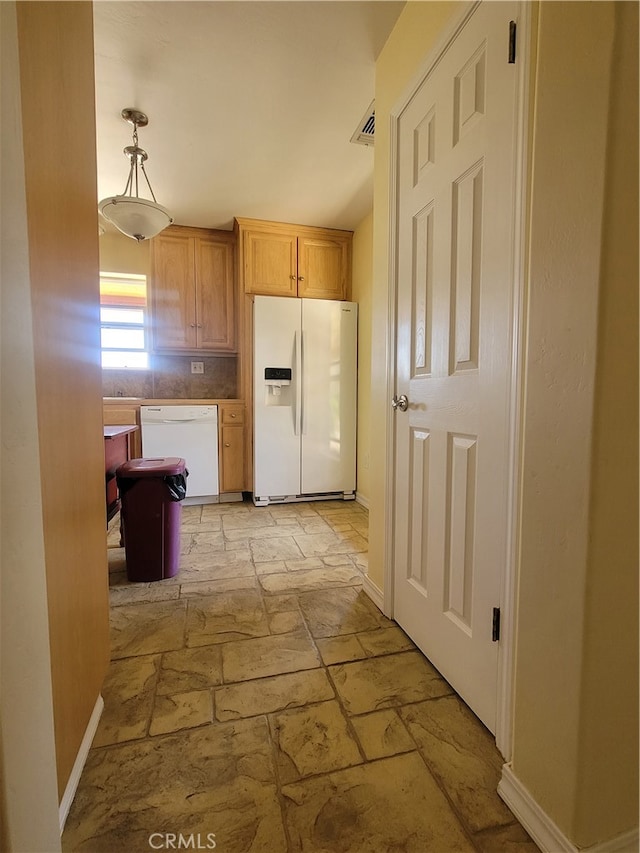 corridor featuring light tile floors