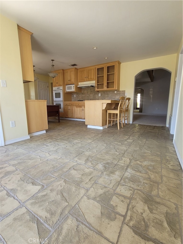 unfurnished living room with light tile floors