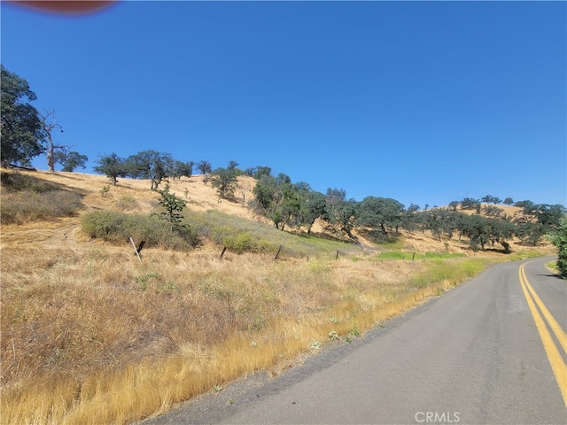 view of street featuring a rural view