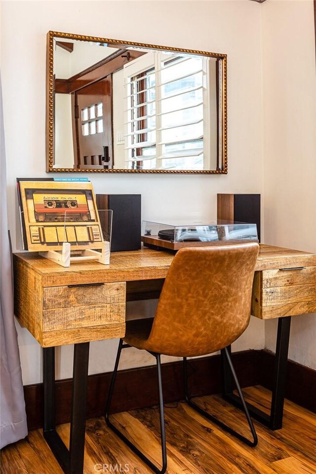 dining room with hardwood / wood-style floors