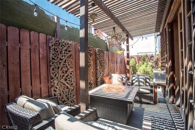 view of patio / terrace with a pergola and outdoor lounge area