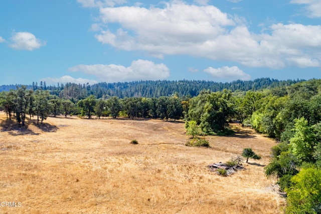 mountain view featuring a rural view