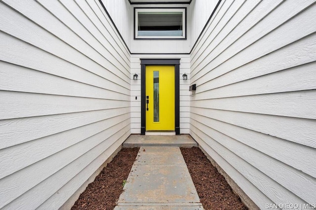 view of exterior entry featuring elevator