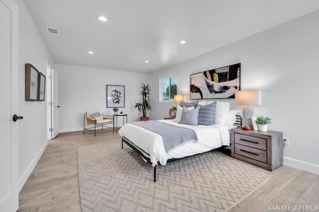 bedroom with light wood-type flooring