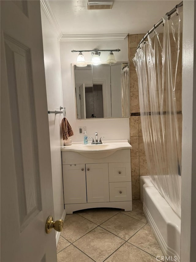 bathroom with crown molding, tile patterned flooring, vanity, and shower / tub combo