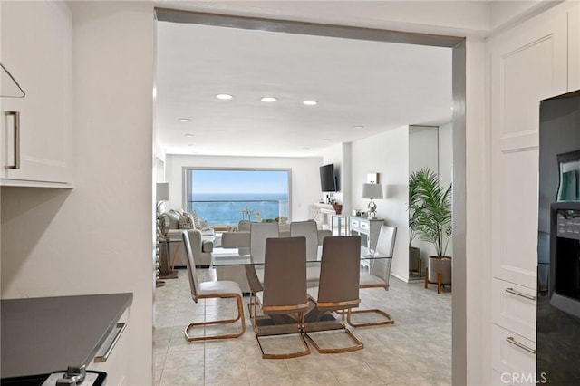 dining space with light tile patterned flooring