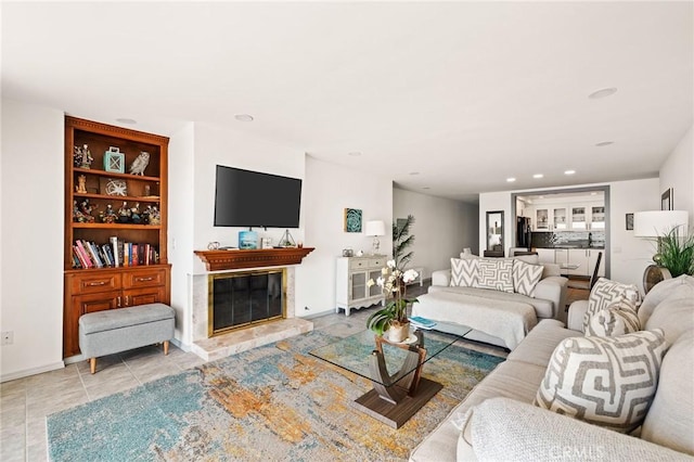 tiled living room featuring built in shelves